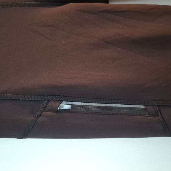 NWT Athleta Rainer Bootcut Pant Reflective Zip Pockets Compression Black Size S - Picture 8 of 10